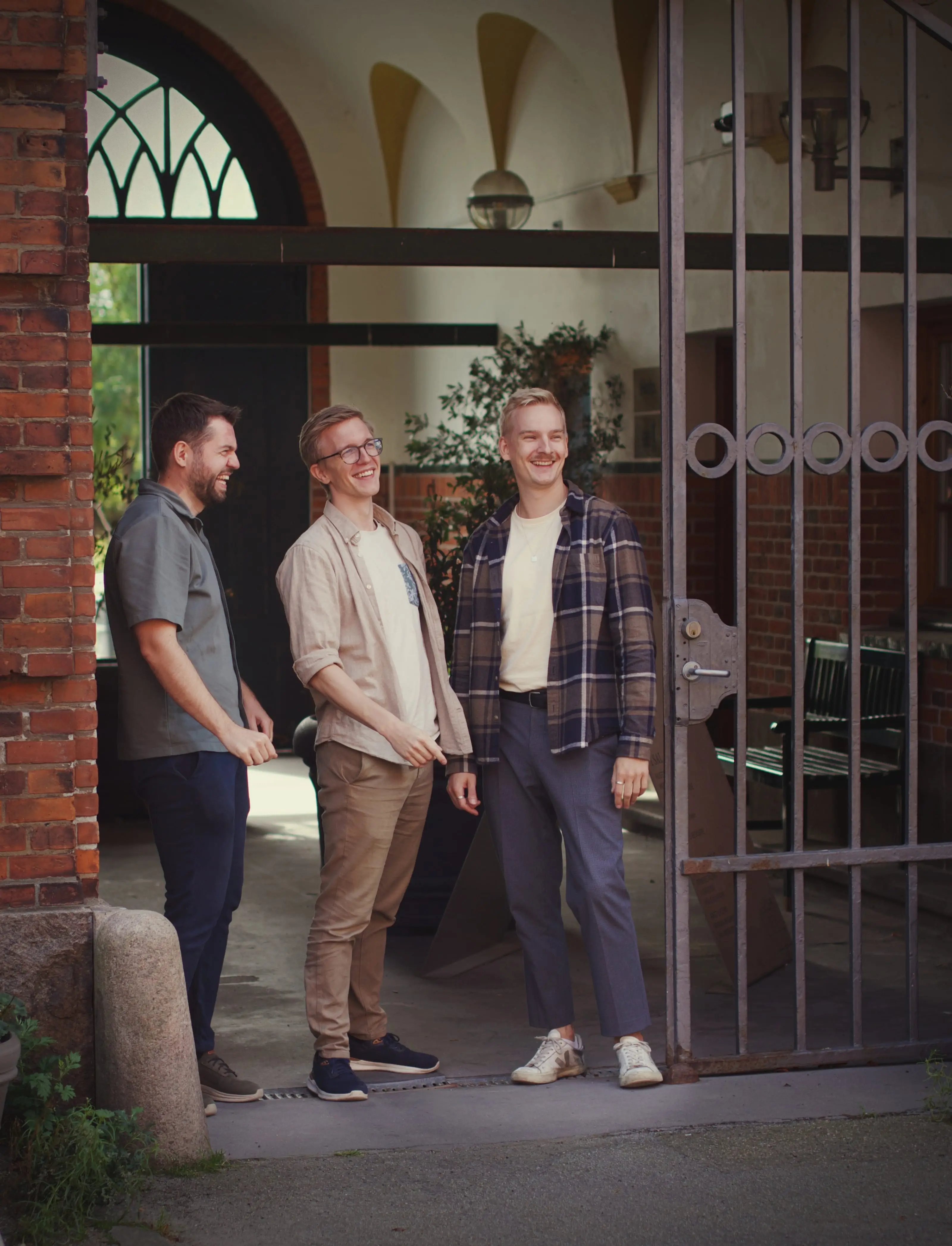 The three founders outside the Copenhagen office